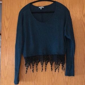 Green cropped long sleeve shirt